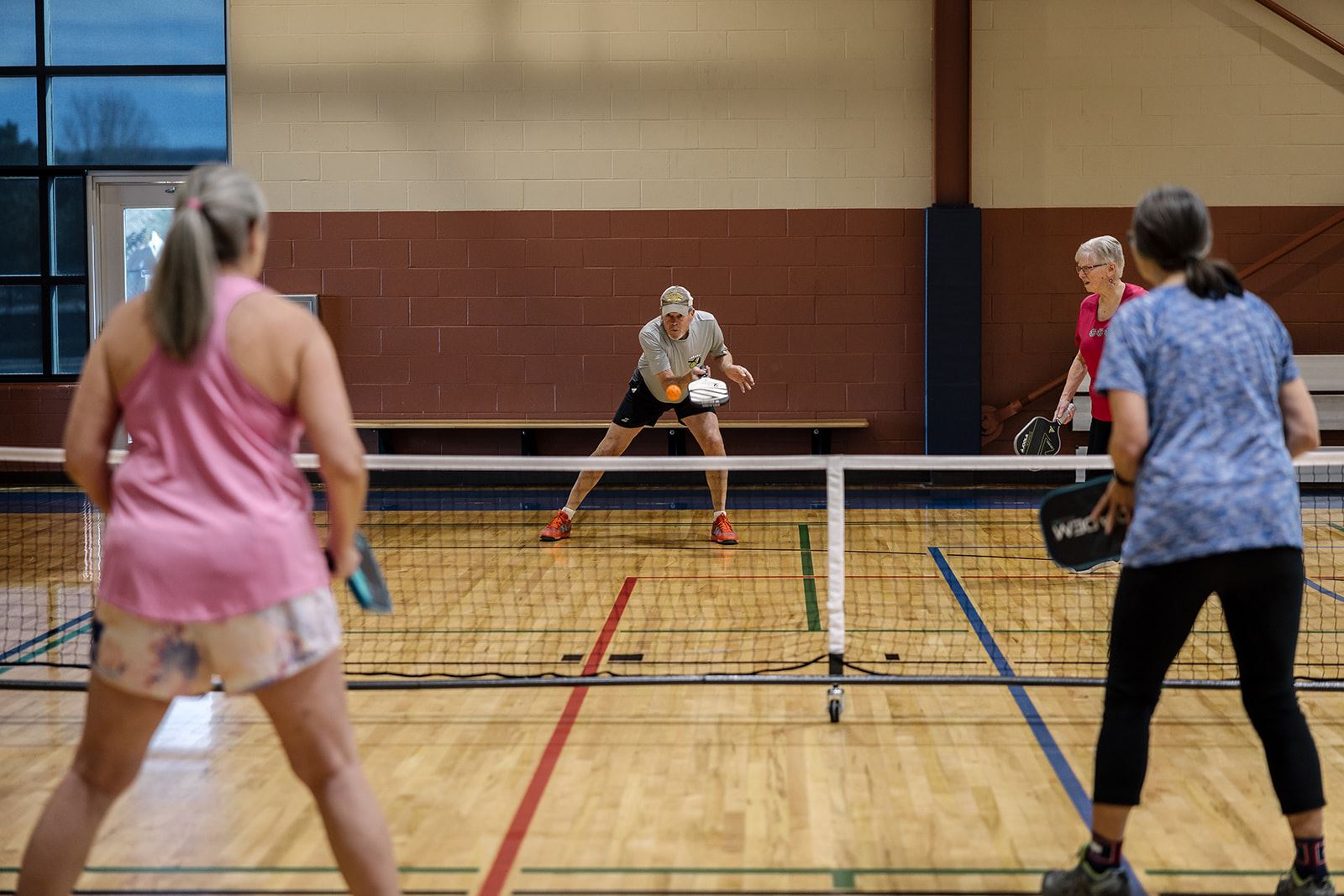 People playing pickleball