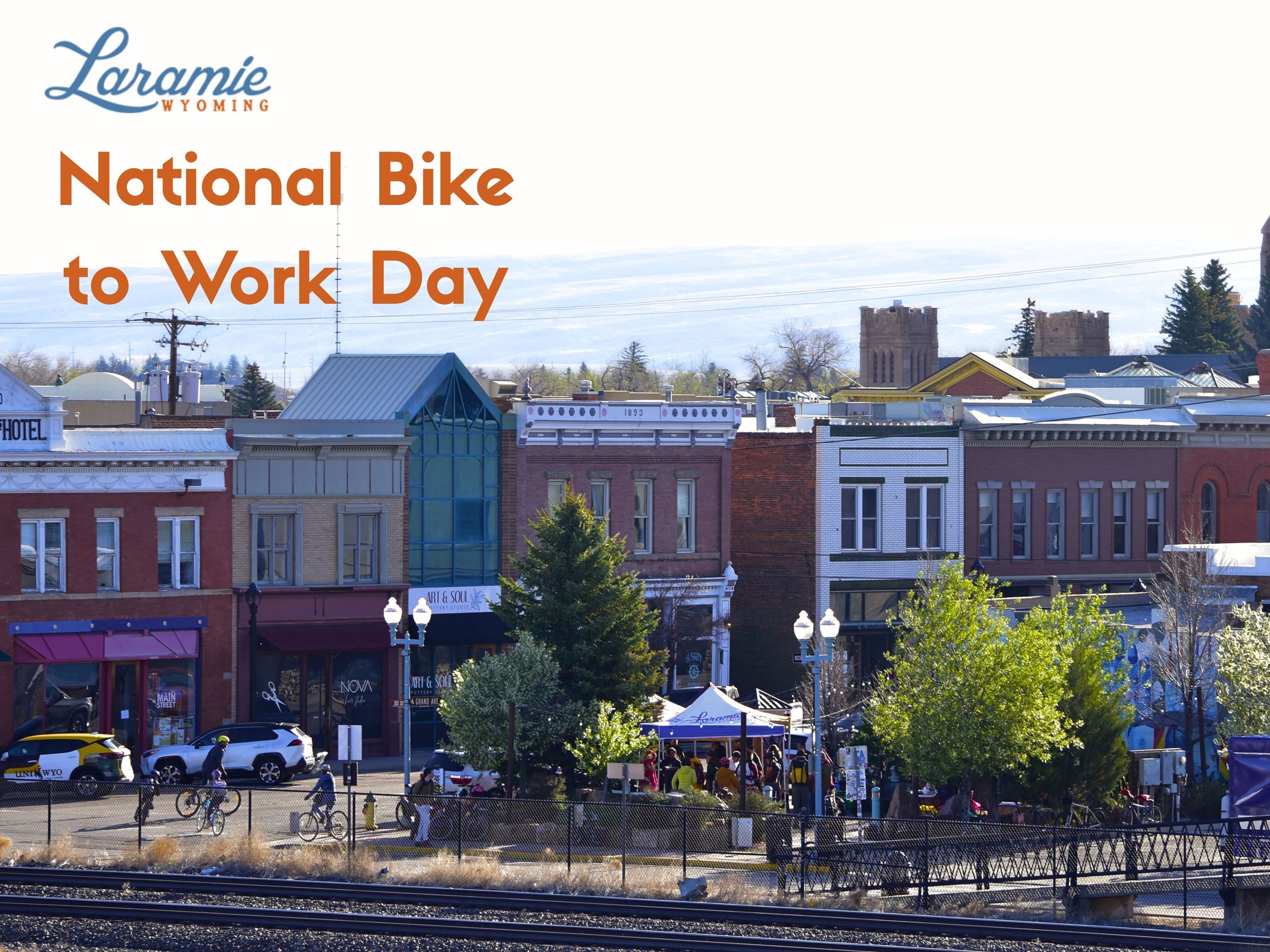 Image from downtown pedestrian bridge over the railroad tracks showing the bike to work day.